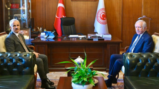 BAKAN URALOĞLU’NDAN CELAL ADAN’A NEZAKET ZİYARETİ